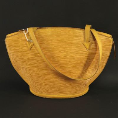 Sold at Auction: Louis Vuitton Yellow Epi Leather 25 Speedy Handbag, with  golden brass hardware, opening to a yellow suede interior with small purple