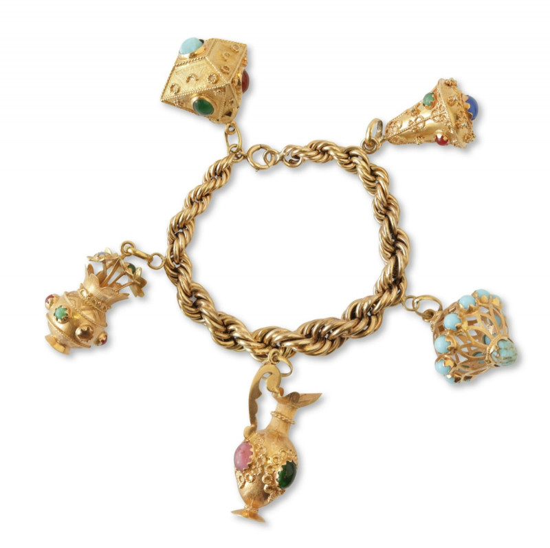 Sold at Auction: 14k gold charm bracelet