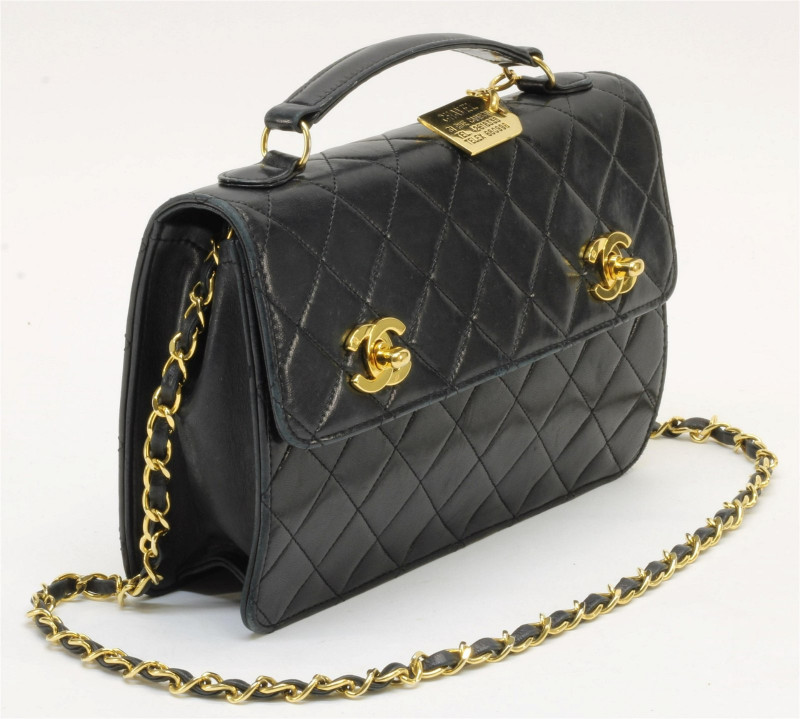 Sold at Auction: Chanel Caviar Navy Leather Flap Bag